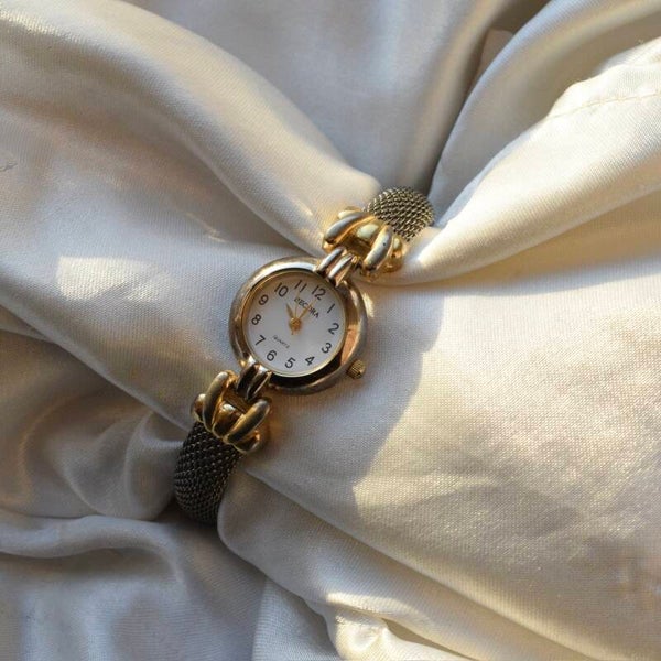 Becora 7.25” ticking two toned watch