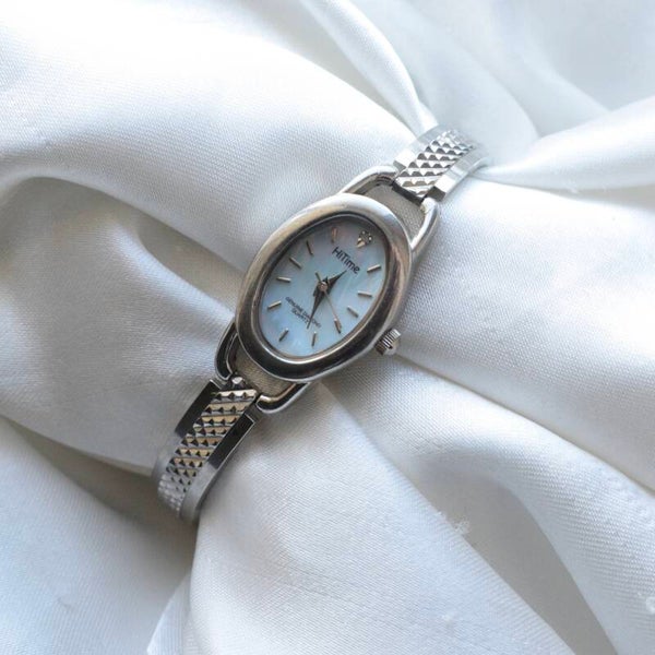 Quemex 7.5” silver ticking watch