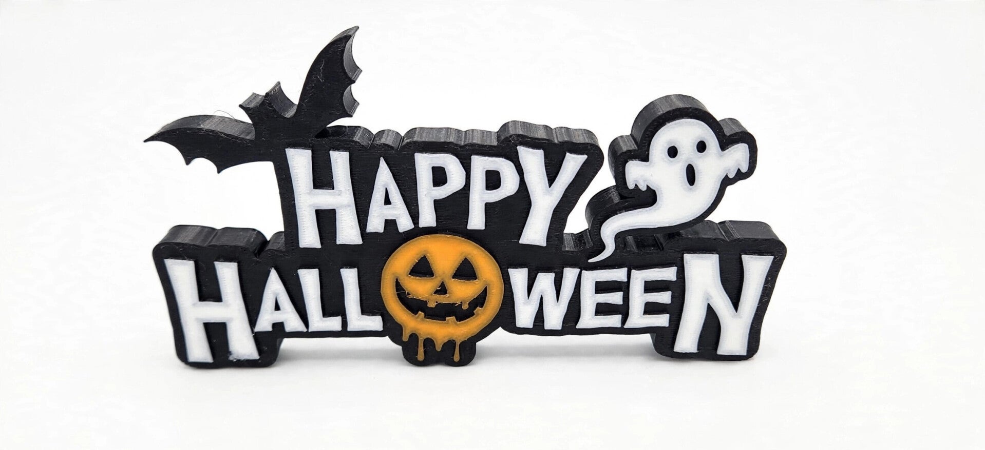 Happy Halloween sign with bat ghost and pumpkin