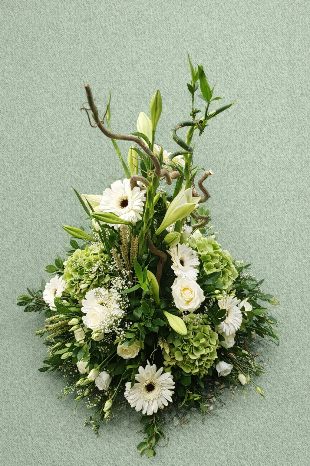 Coussin conique blanc et vert