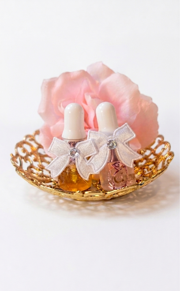Schaaltje roqya olie en rozenwater 5 of 1 ml I