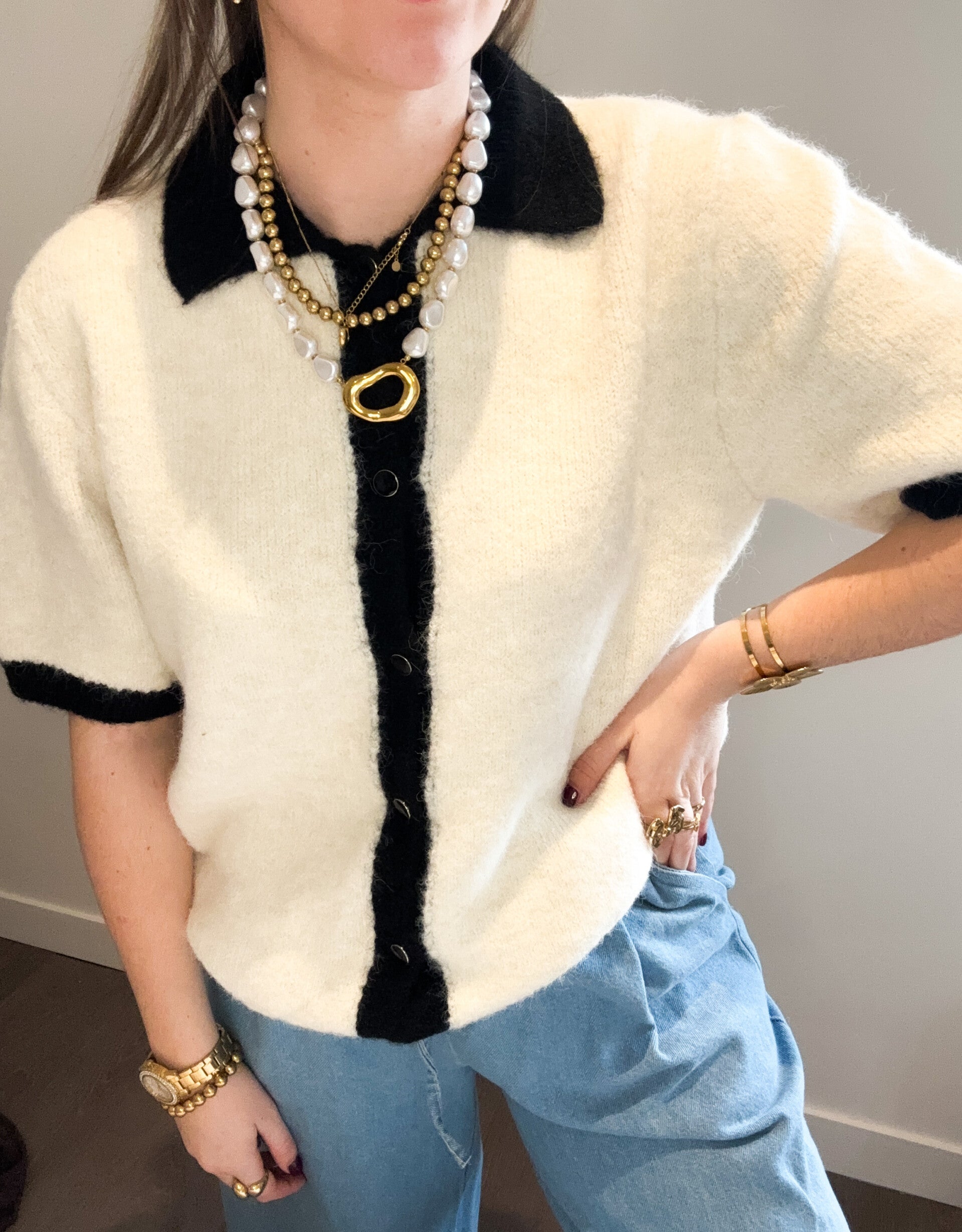 Créme and black sweater