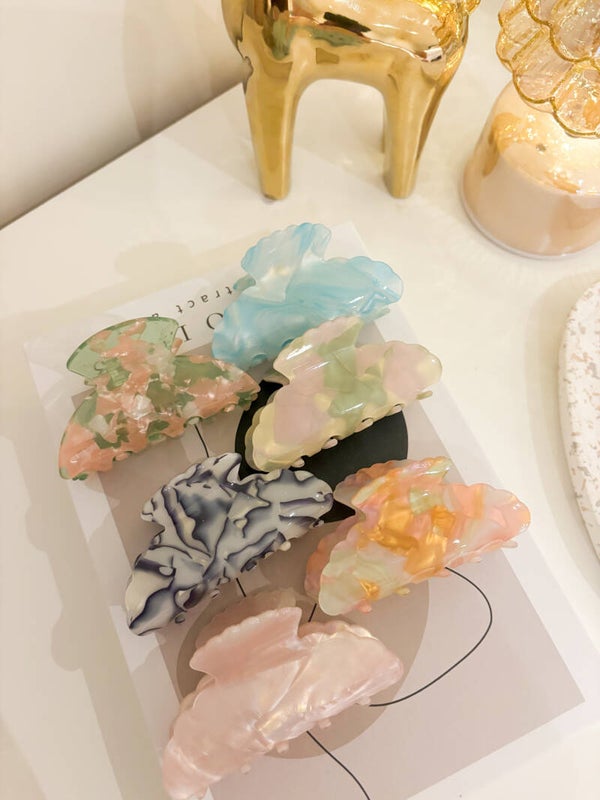 Kleine kleurige haarklemmen