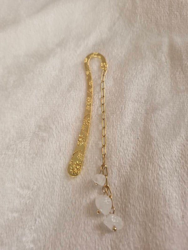 Boekenlegger goud wit glazig