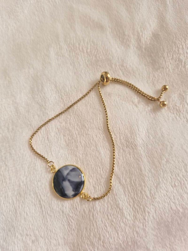 Armband goudkleurig zwart 1