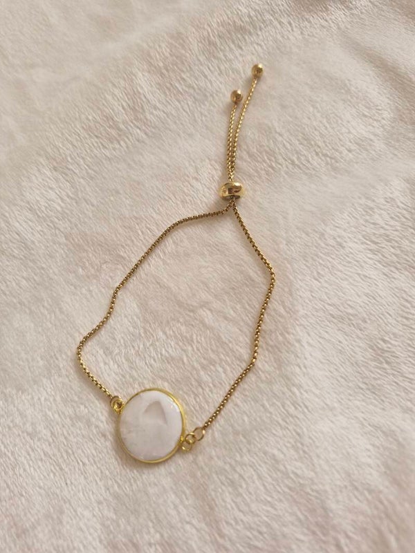 Armband goudkleurig wit 1