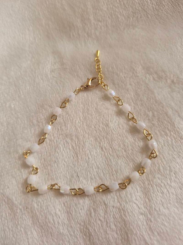 Armband goudkleurig kraal schakel parel