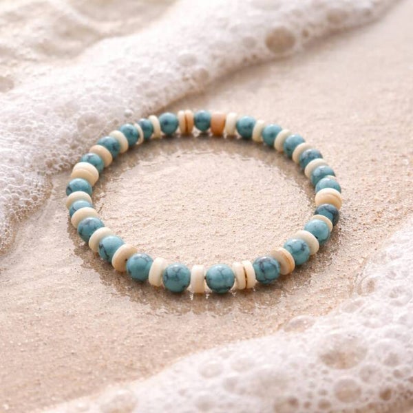 Armband turqoise met schelpkralen