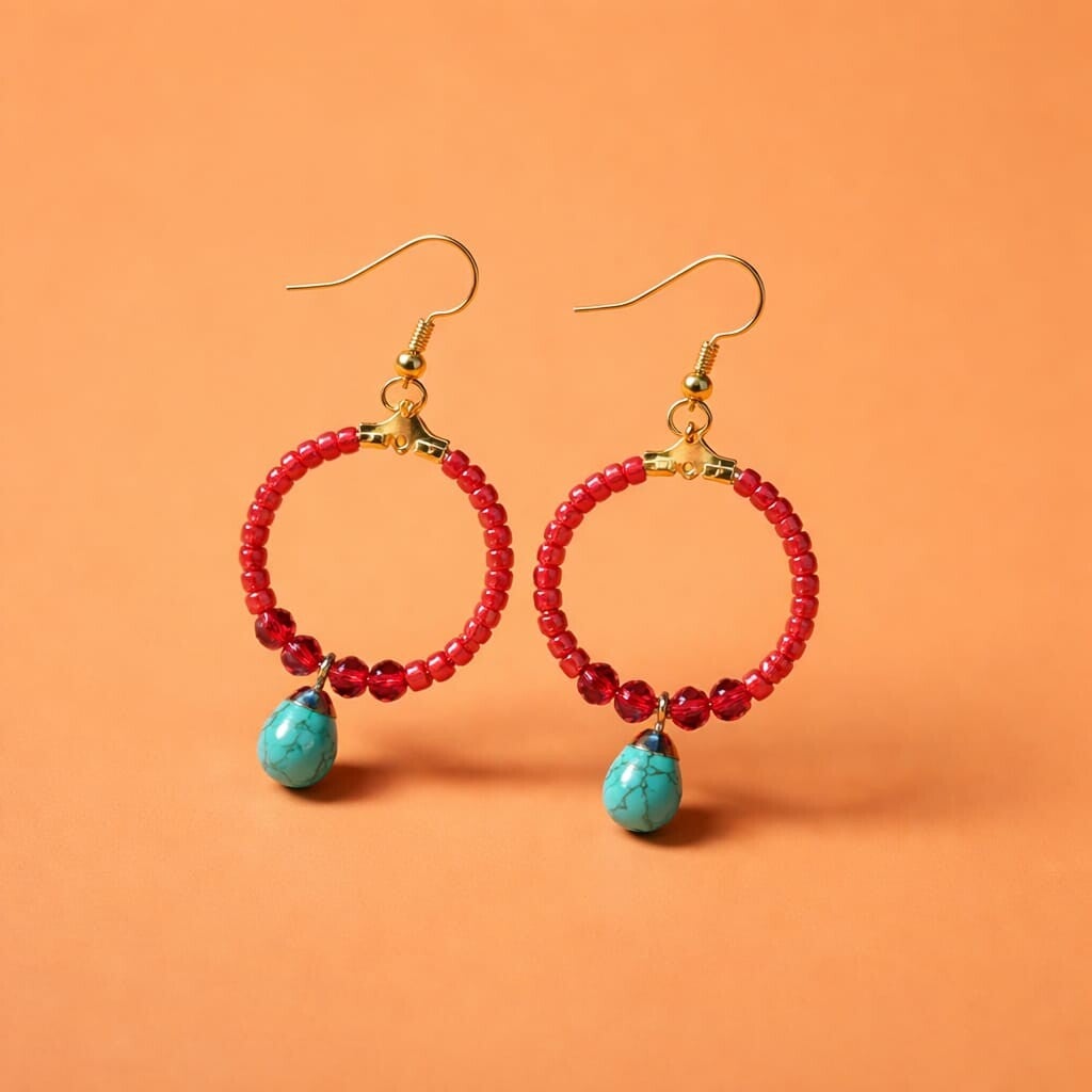 Kleurige hoops met turqoise bedel