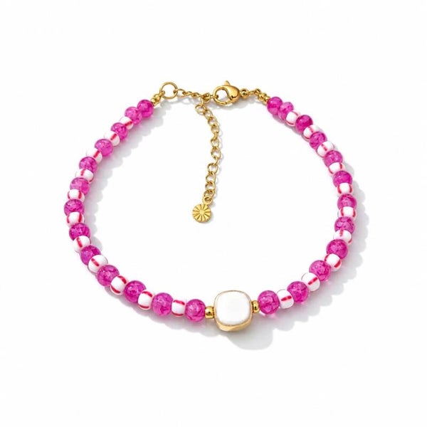 Glaskraal armbandje met schelpbedel