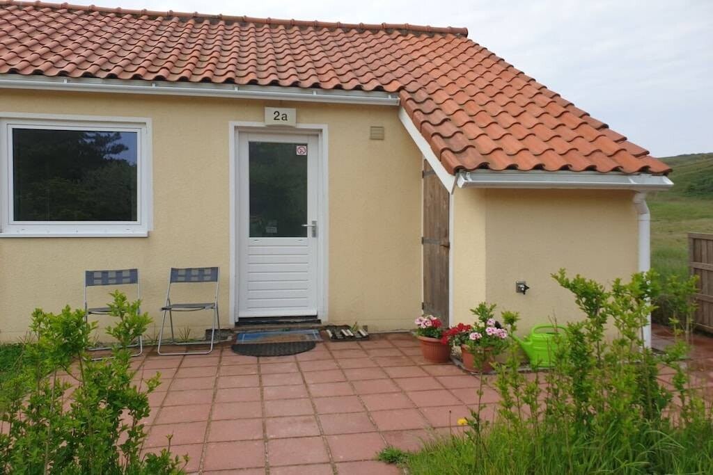 Vakantiehuisje met omheinde tuin en aan het strand 4 gasten De Koog, Texel, Nederland