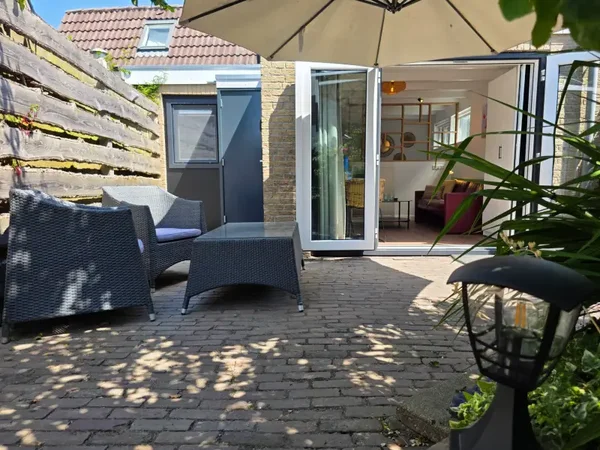 Vakantiehuisje "Achter de Zandduyn" met omheinde tuin 2 gasten De Koog Texel
