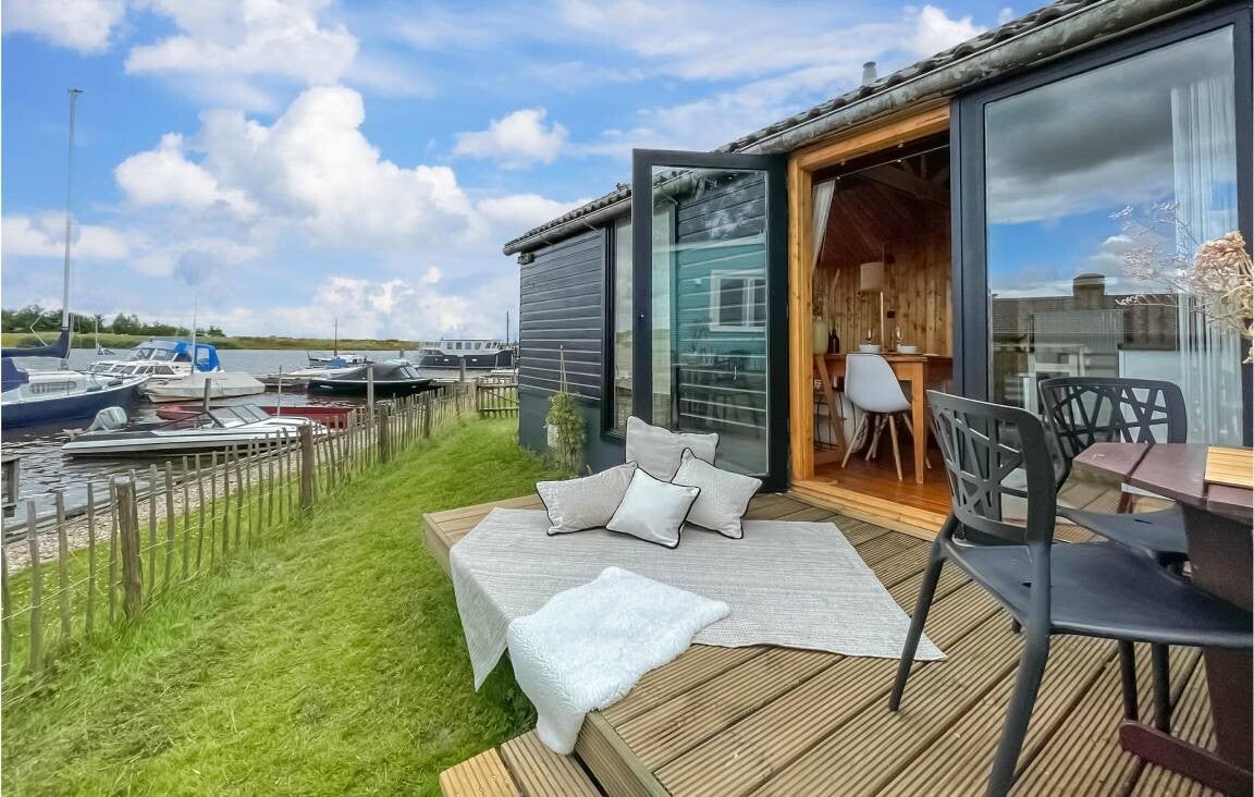 Sfeervolle huisje met omheinde tuin en panoramisch uitzicht  4 gasten Lauwerzijl, Groningen, Nederland