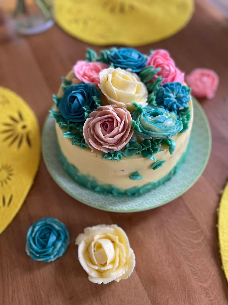 cake with rose on top