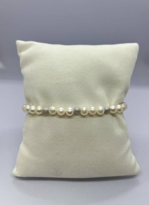 Bracciale in perle con 3 sfere in oro bianco