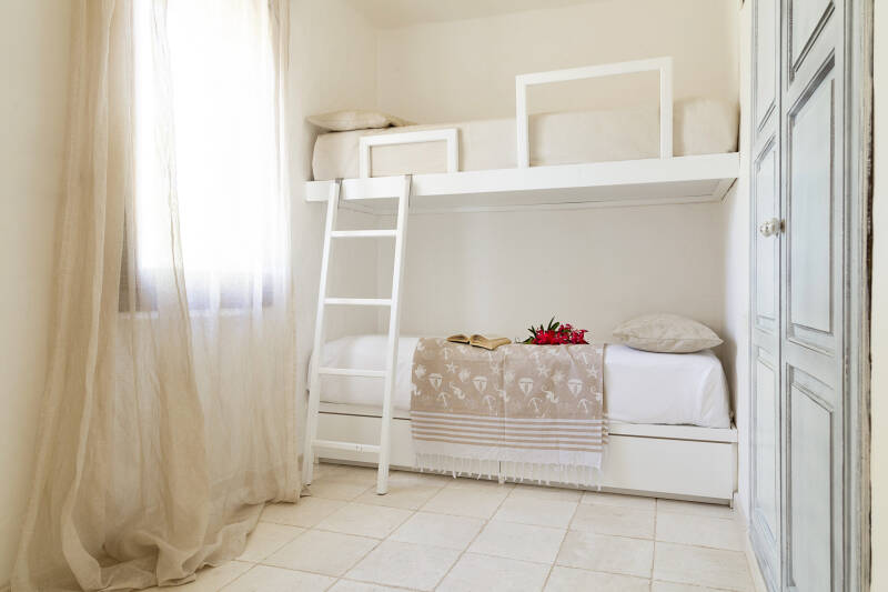 Double room with comfortable Simmons beds at the holiday home Residence Capraggia in La Conia near Cannigione, Esmeralda Coast.