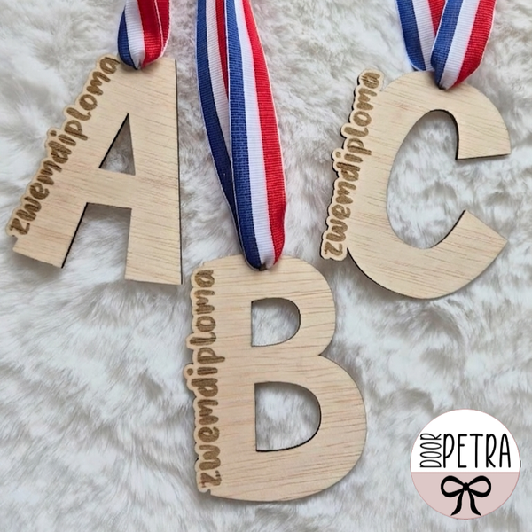 Zwemdiploma medaille met naam