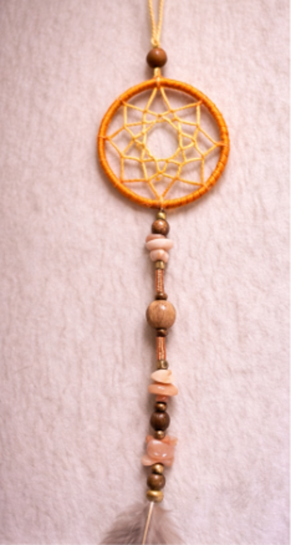 Pendule solaire – pierre de soleil et plumes de faisan
