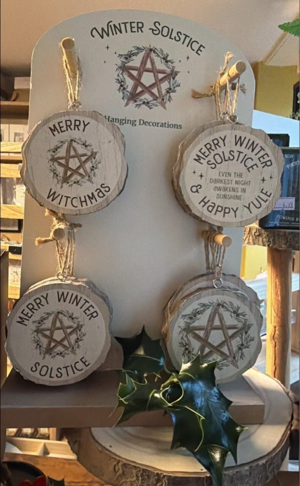 Winter solstice hanging signs