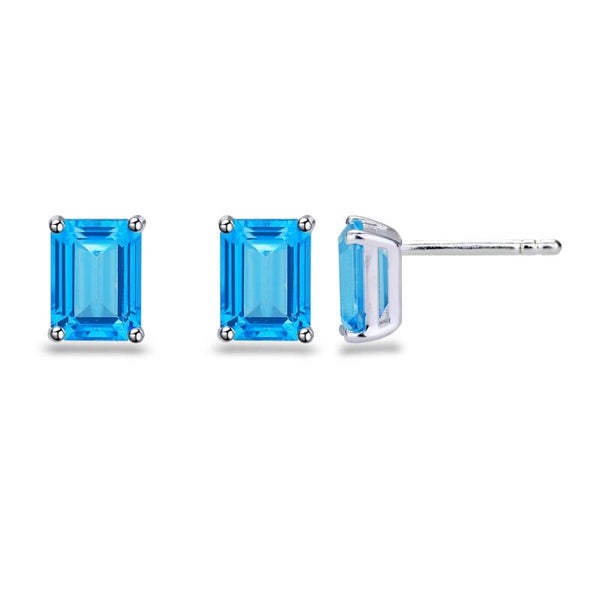 Zilveren oorknoppen met blauw topaas