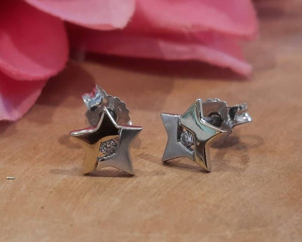 Zilveren ster oorknoppen in bicolor met zirconia's
