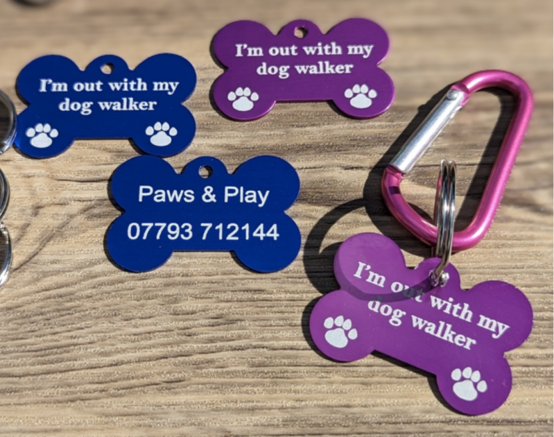 I'm out with my dog walker ID tags