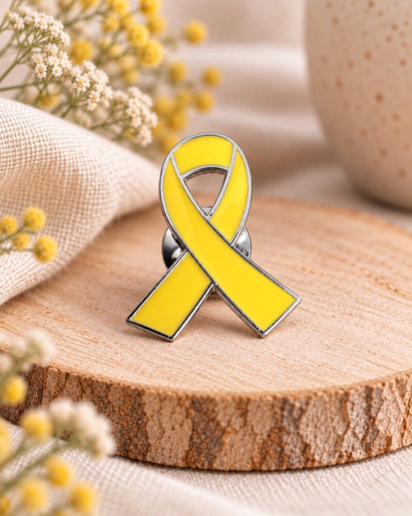 Pin's ruban jaune – Soutien endométriose 🎗️