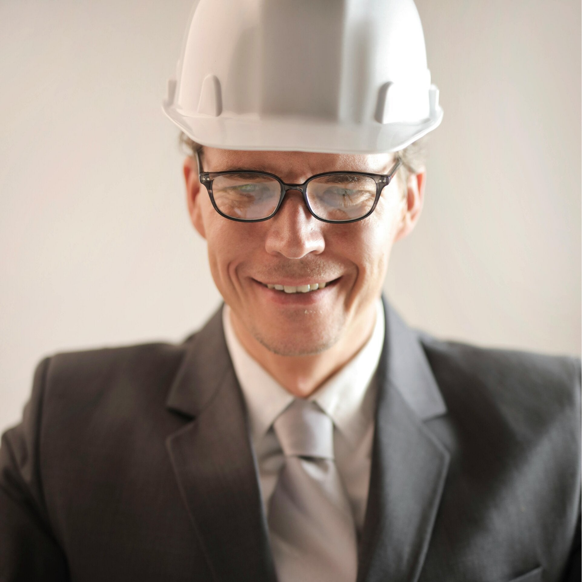 Safety Solutions Alberta | Success Safety Solutions | Image of a Oil Executive with a white hard hat