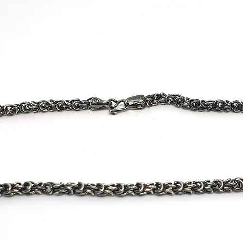 Rodium verstrengelde schakels ketting