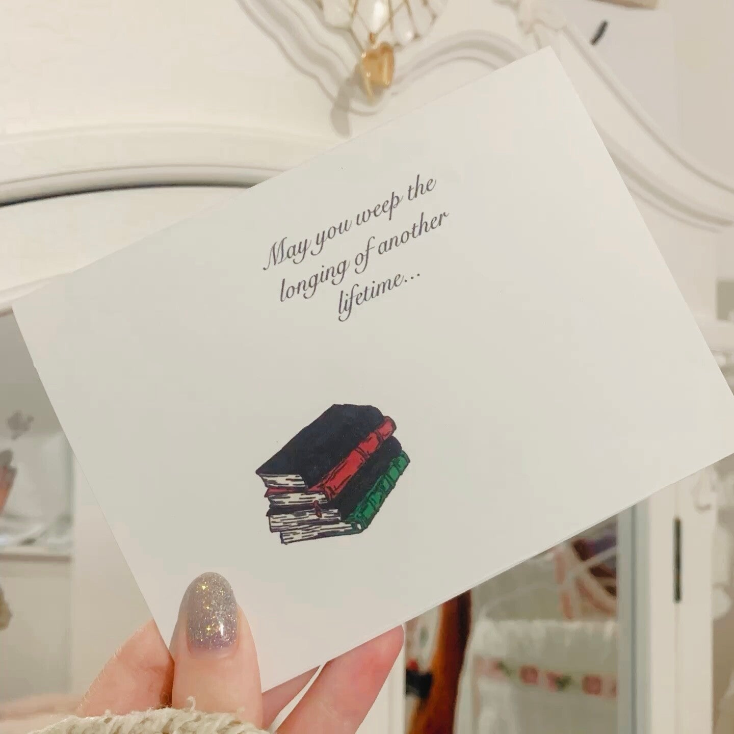 Greeting Card With Stack Of Books And Quote