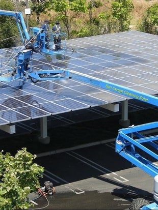 Parking garge solar cleaning