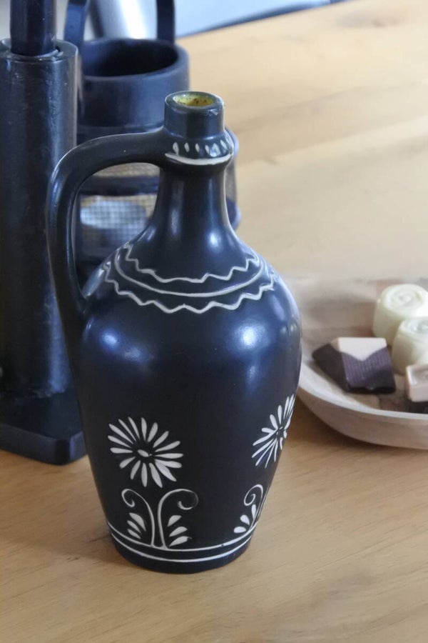 Vintage vaas zwart met crèmekleurige tekening