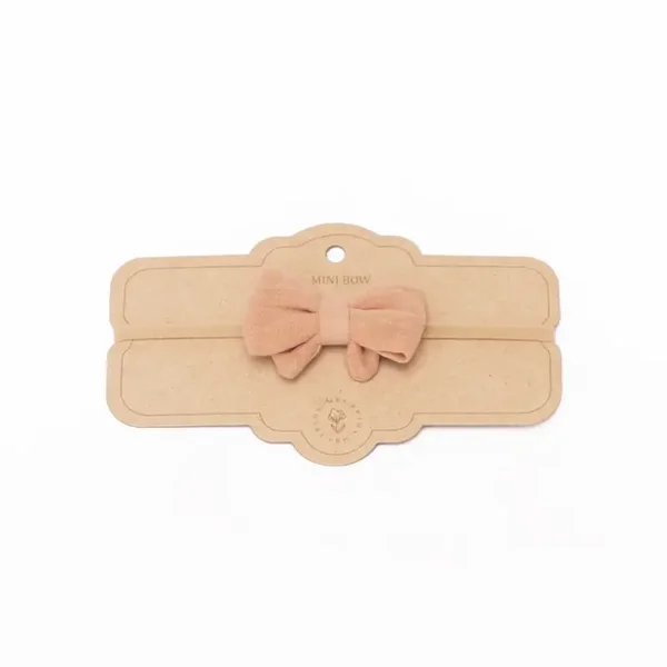 Hoofdband met strikje - blush