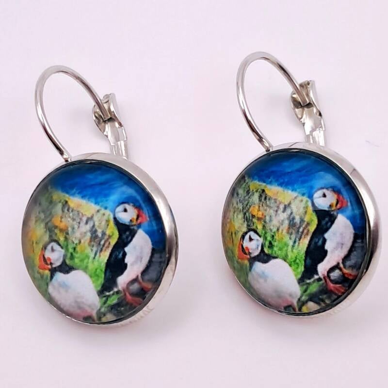 Earrings featuring vibrant  puffin artwork under glass cabochons - available in hypoallergenic silver or antique bronze, measure 2cm.  Price 20€