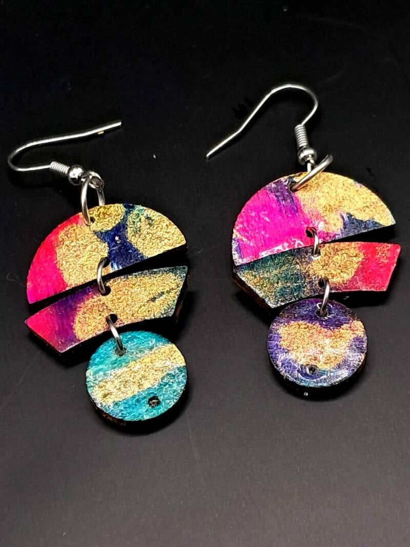 Hand-painted abstract lightweight laser cut wooden earrings, Hypoallergenic, measures 5 x 5cm.  Price 20€