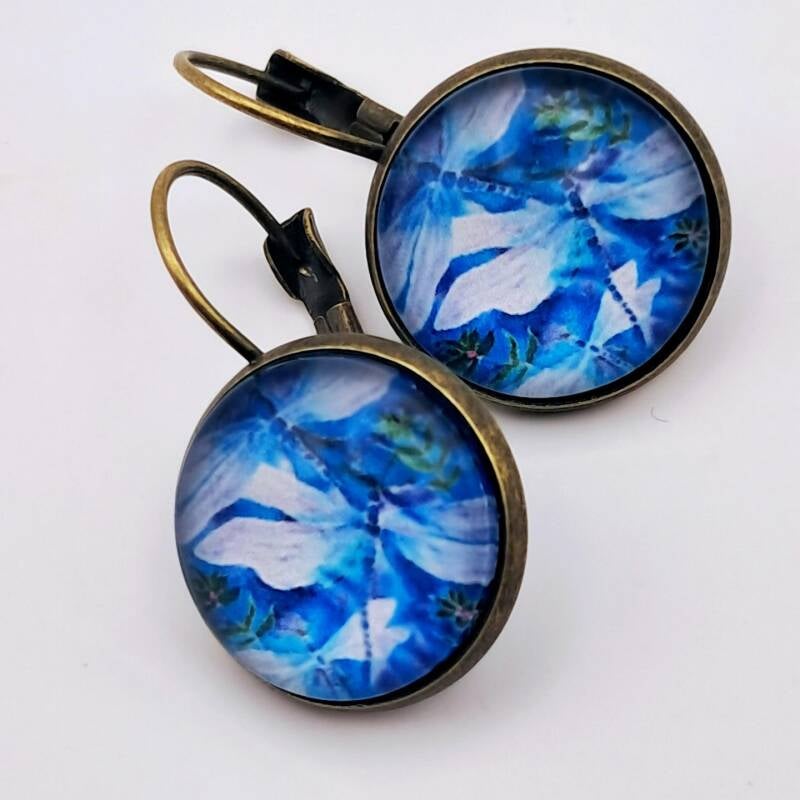 2cm dragonfly earrings featuring vibrant silk art under glass cabochons, hypoallergenic  antique bronze.  Price 20€