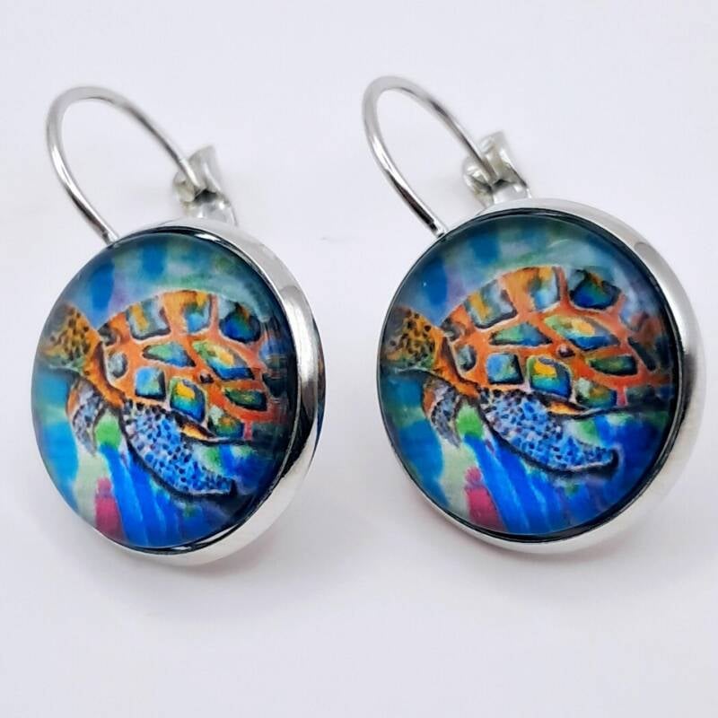 2cm sea turtle earrings featuring vibrant silk art under glass cabochons,   hypoallergenic  antique bronze.  Price 20€