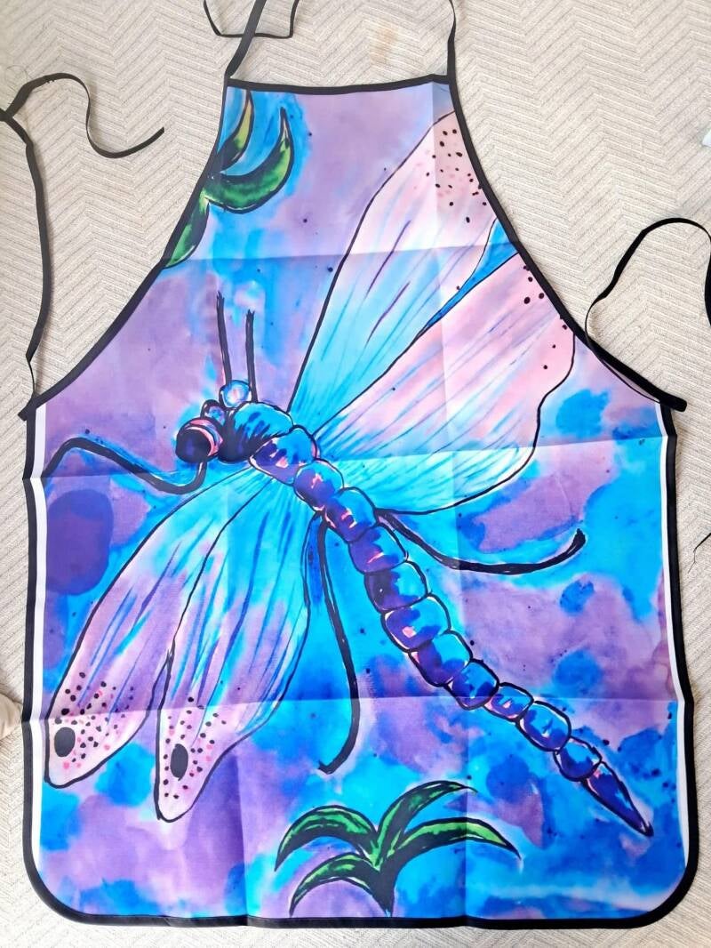 Printed apron featuring my original dragonfly artwork! Perfect for Cooking &amp; Crafting.  Size: 60cm x 80cm Price: 20€