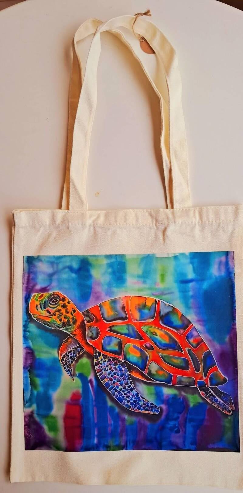 Take my original artwork out of the gallery and into your daily routine. This canvas tote bag features a high-definition reproduction of my vibrant painting  Price at  15€
