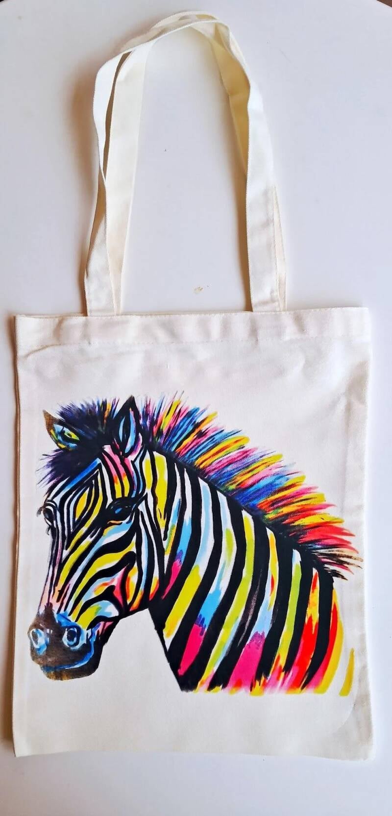 Take my original artwork out of the gallery and into your daily routine. This canvas tote bag features a high-definition reproduction of my vibrant painting  Price at  15€