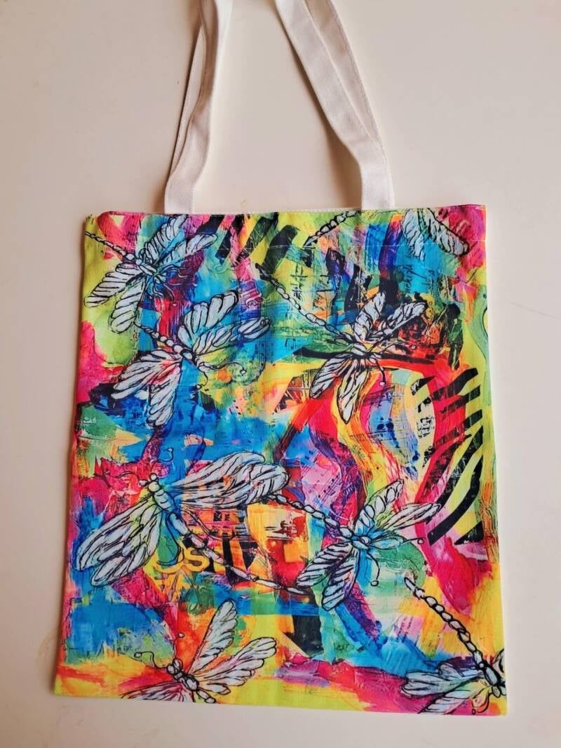 Take my original artwork out of the gallery and into your daily routine. This canvas tote bag features a high-definition reproduction of my vibrant painting  Price at  15€