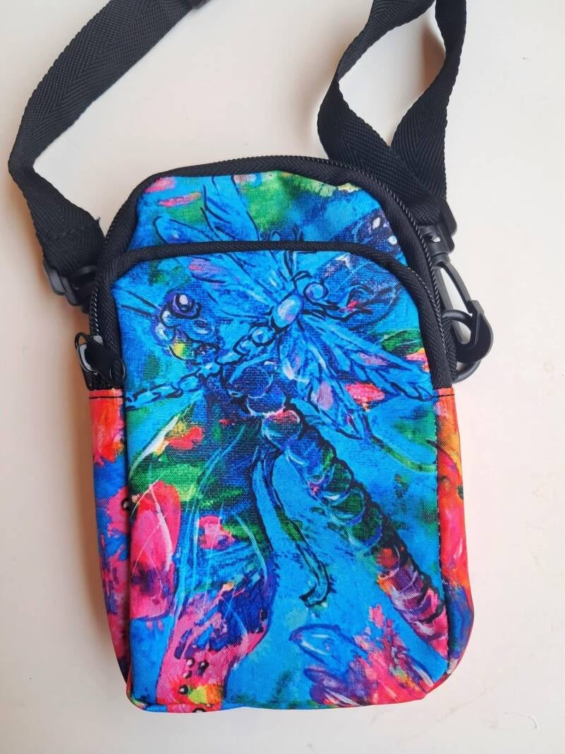 Nature-Inspired Phone Crossbody Compact 18x12cm dual-pocket bag with original artwork and adjustable strap for essentials.  Price25€