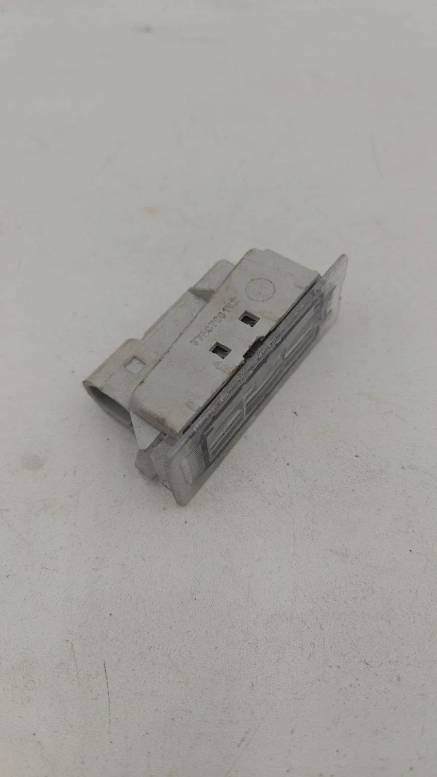 ECLAIREUR DE PLAQUEORIGINE RENAULT LAGUNA 2 II 7700796162