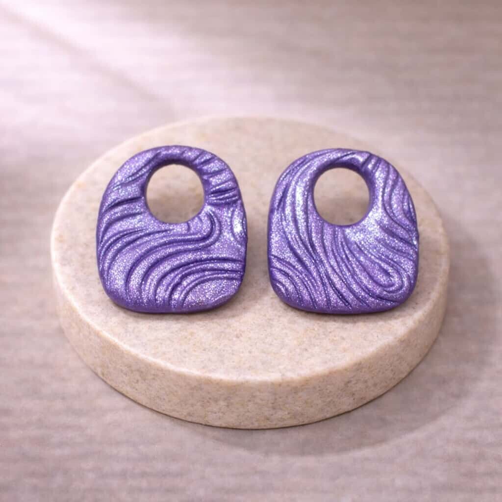 Pampilles violettes dentelées