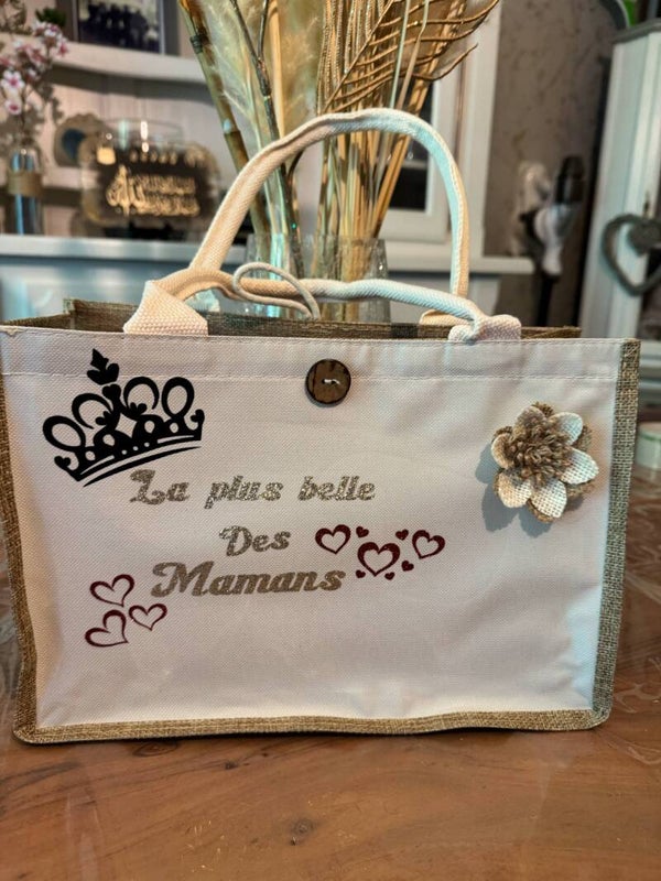 sac cabas blanc avec fermeture par attache et bouton