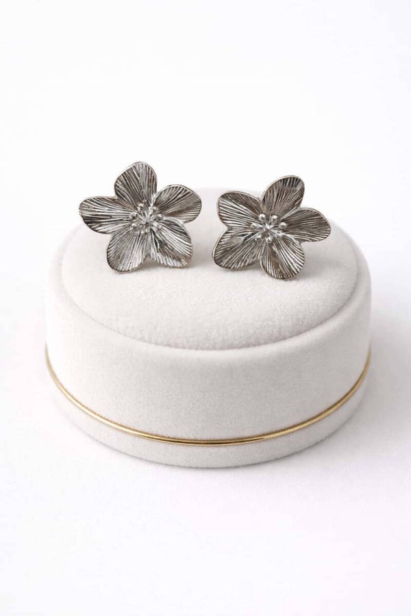Boucles d’oreilles fleurs argentées