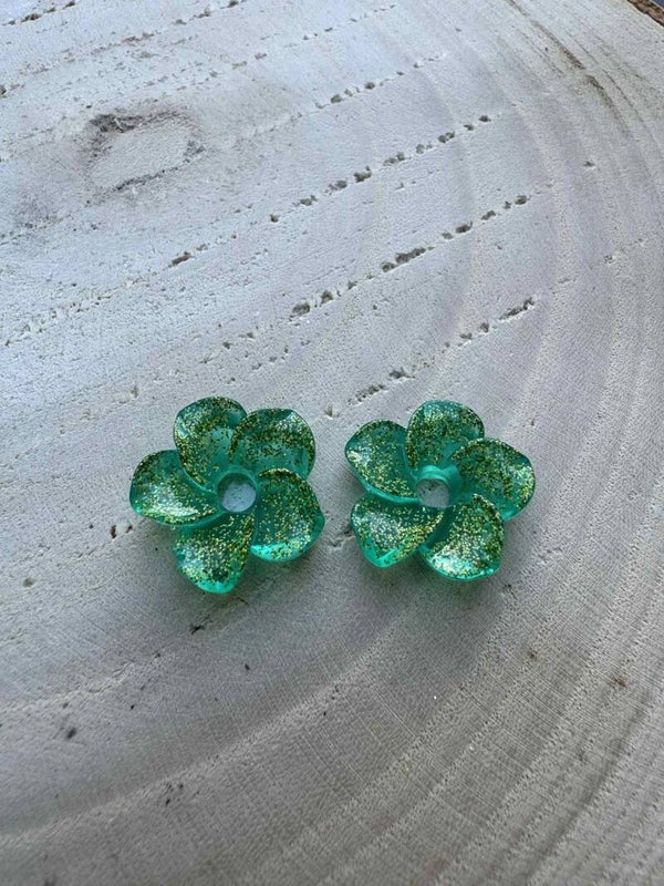 fleur verte transparente pailletée