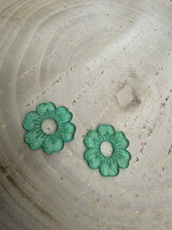 fleur plate verte transparente pailletée