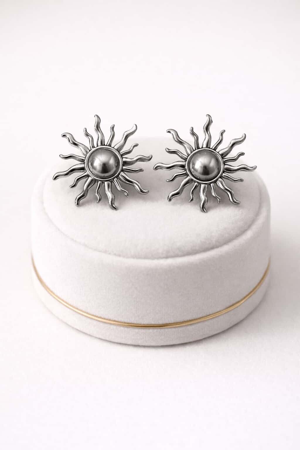 Boucles d’oreilles argentées soleil