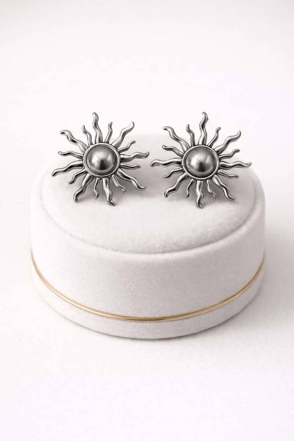 Boucles d’oreilles argentées soleil